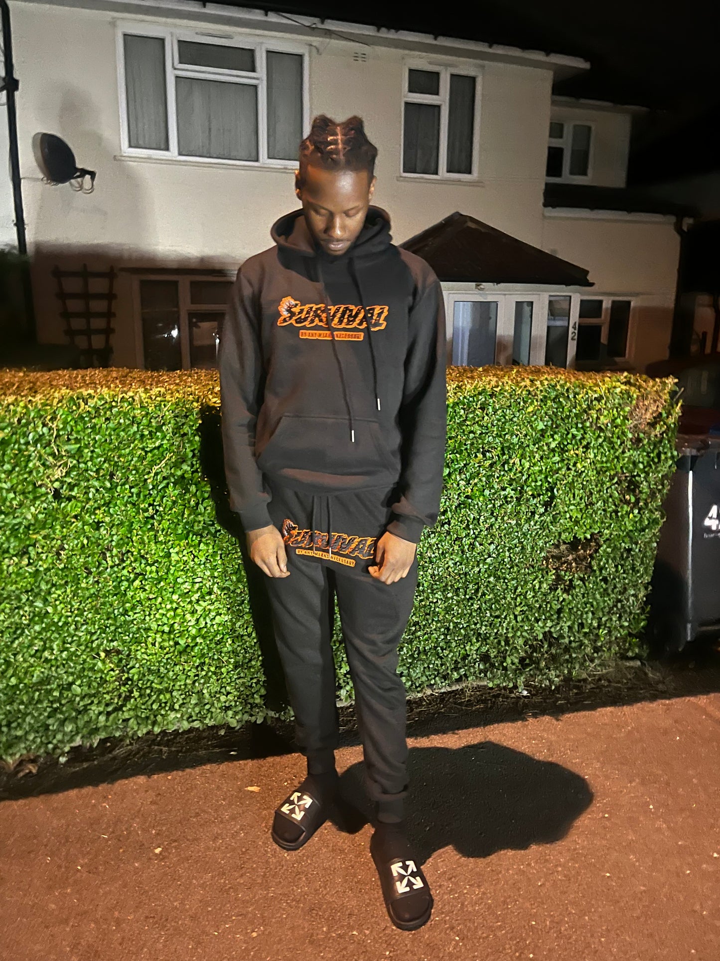 Sunset orange tracksuit (black)